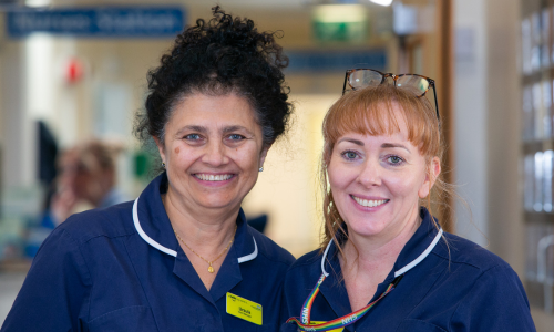 Two members of staff smiling at Lewes Victoria Hospital